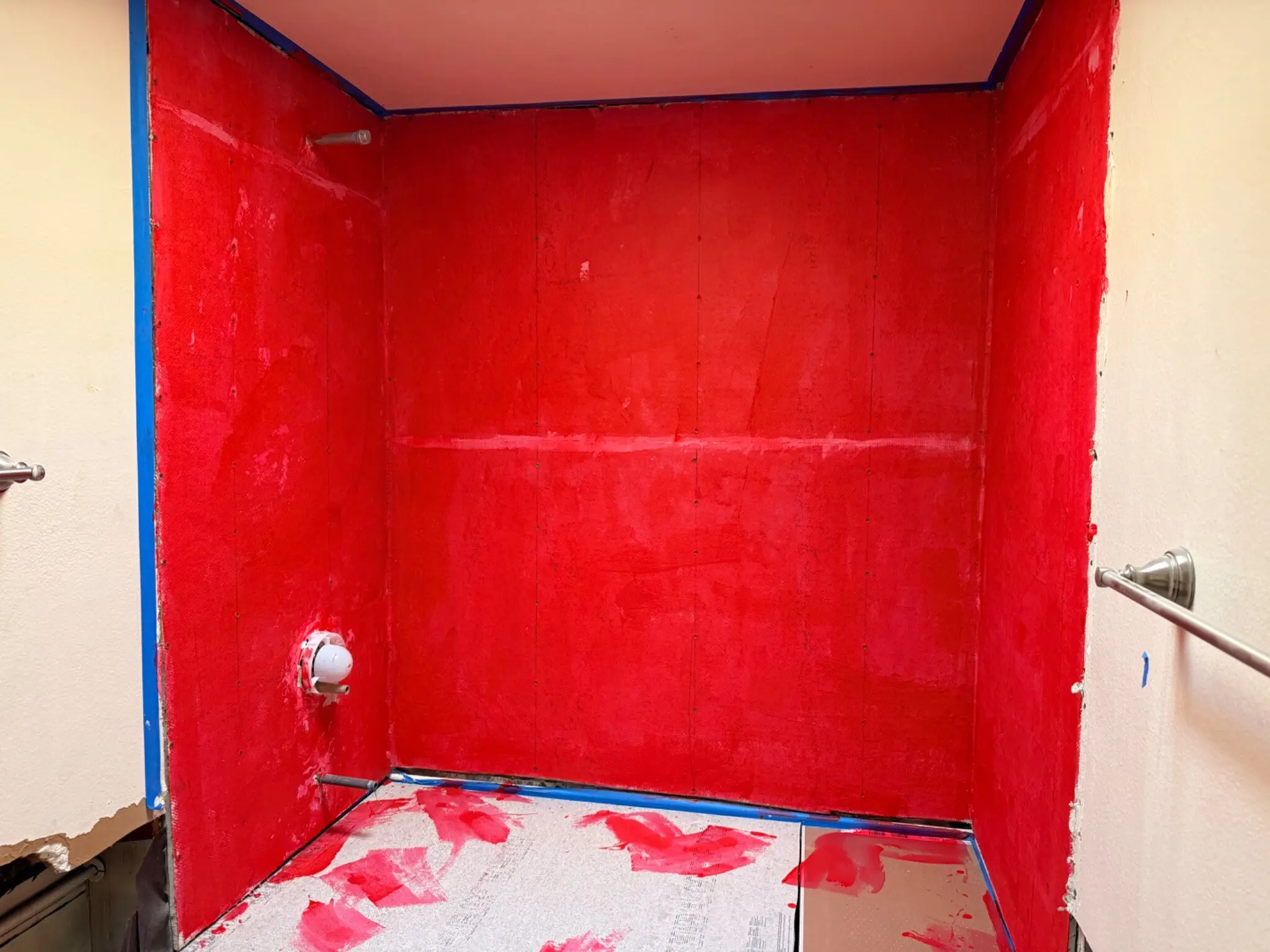Waterproofed bathroom walls and floor during the Irvine condominium remodel
