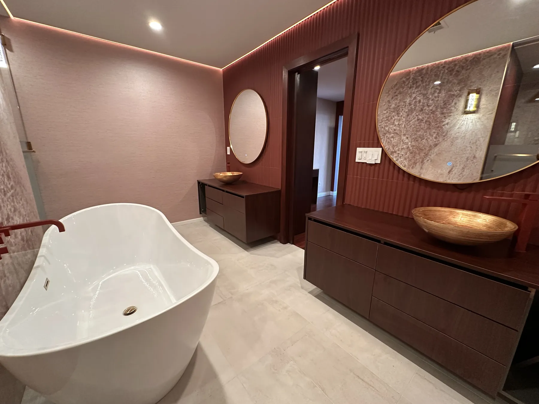 Primary bath with freestanding tub and vessel sinks